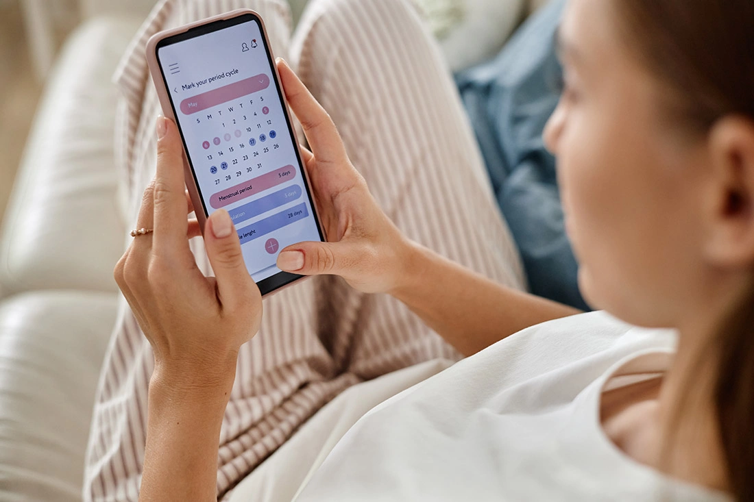 A woman tracking her menstrual cycle